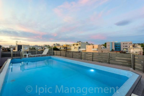 City center apartment with ROOFTOP swimming pool